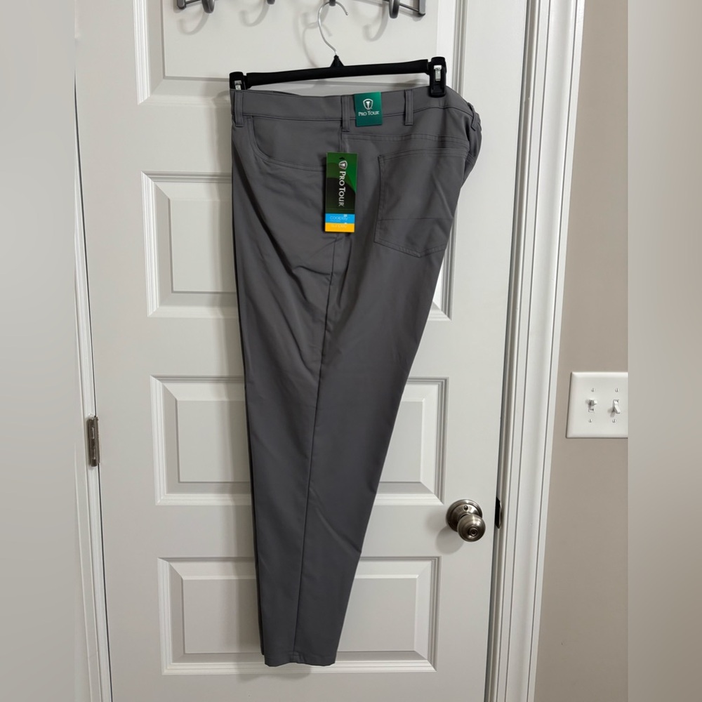 Men’s gray ProTour pants with moisture wicking Coolplay and spf 50 Sunplay.